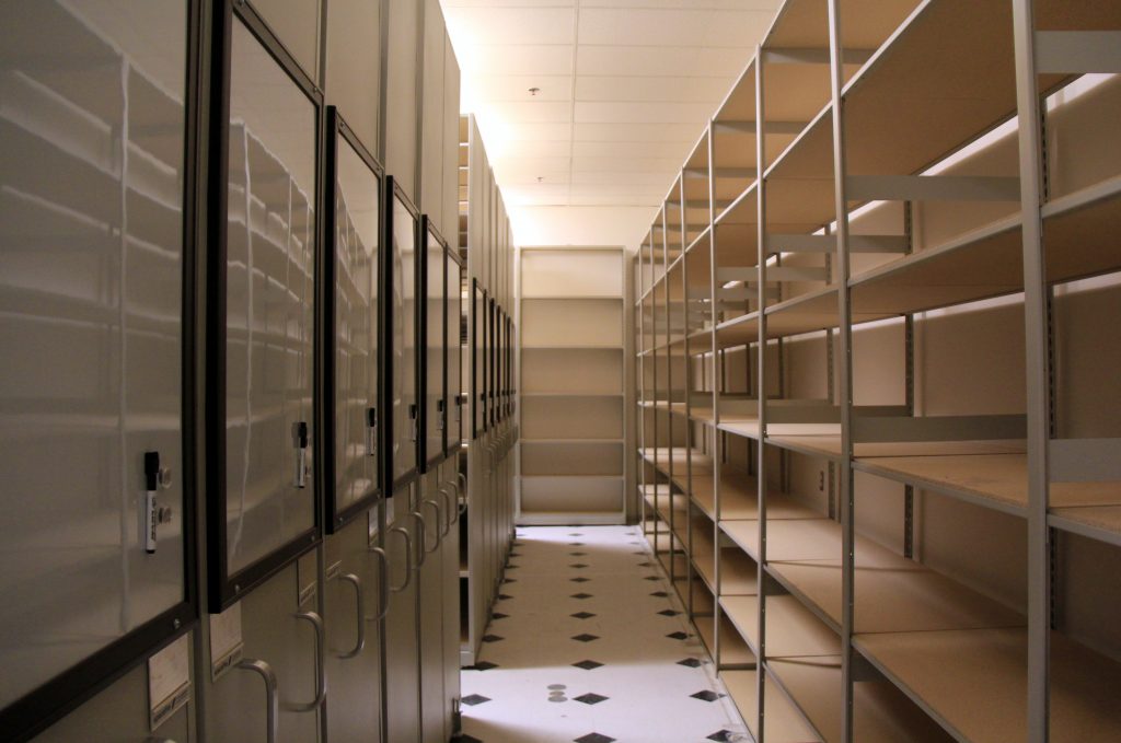 image of high density shelving and storage in a retail stockroom