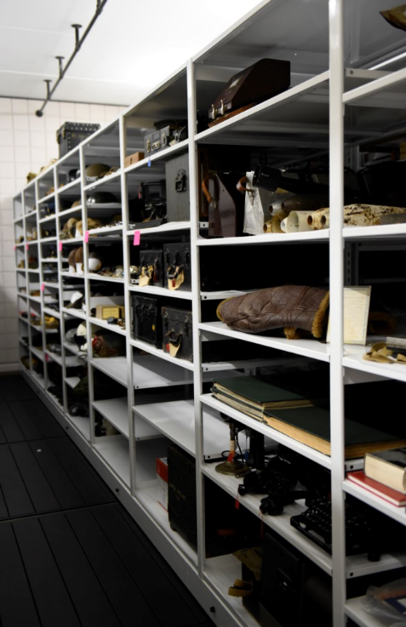 image of artifacts in high density storage unit at Canadian Warplane museum